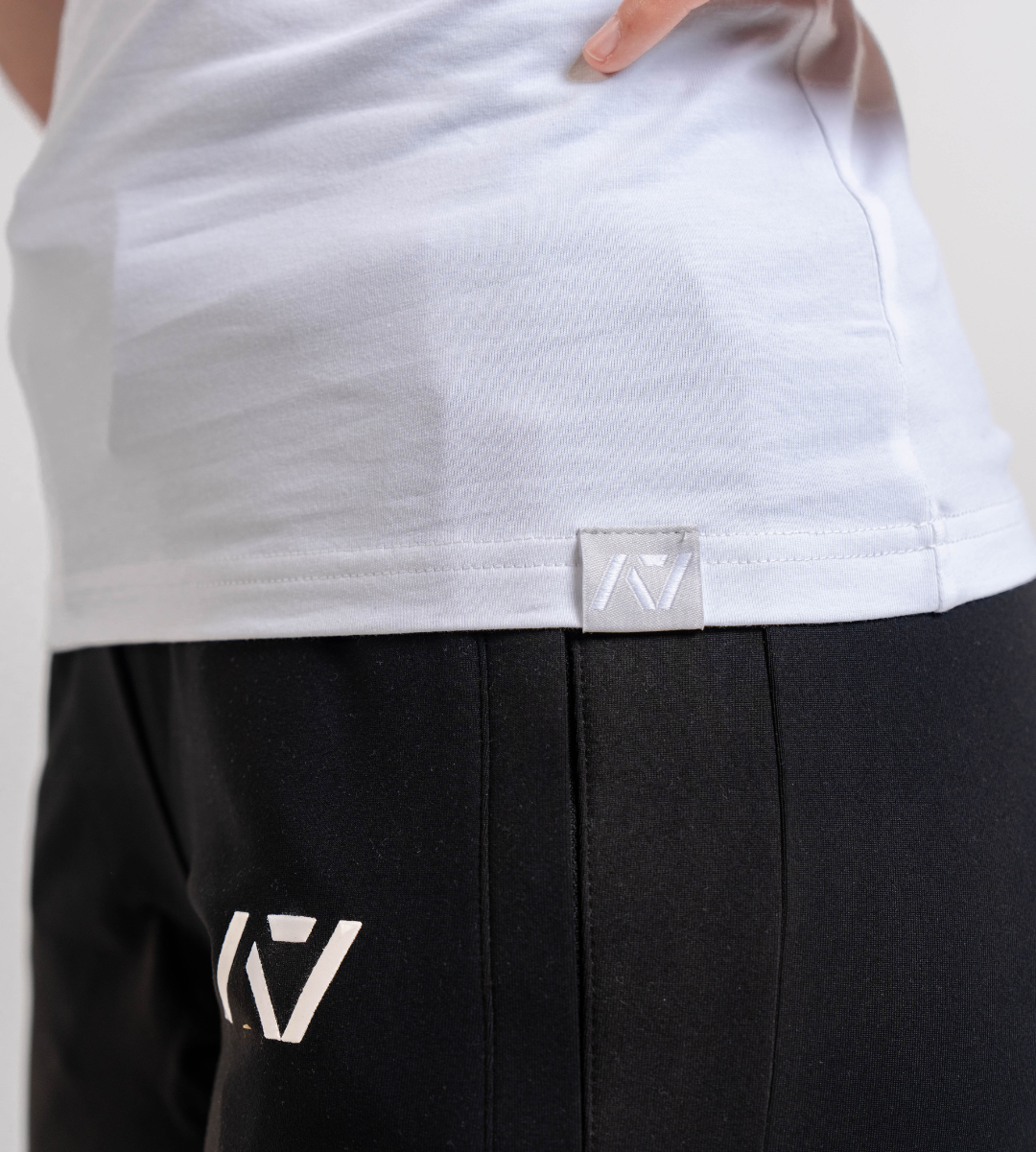 Bottom Hem Tag with A7 Logo on the bottom front of the meet shirt