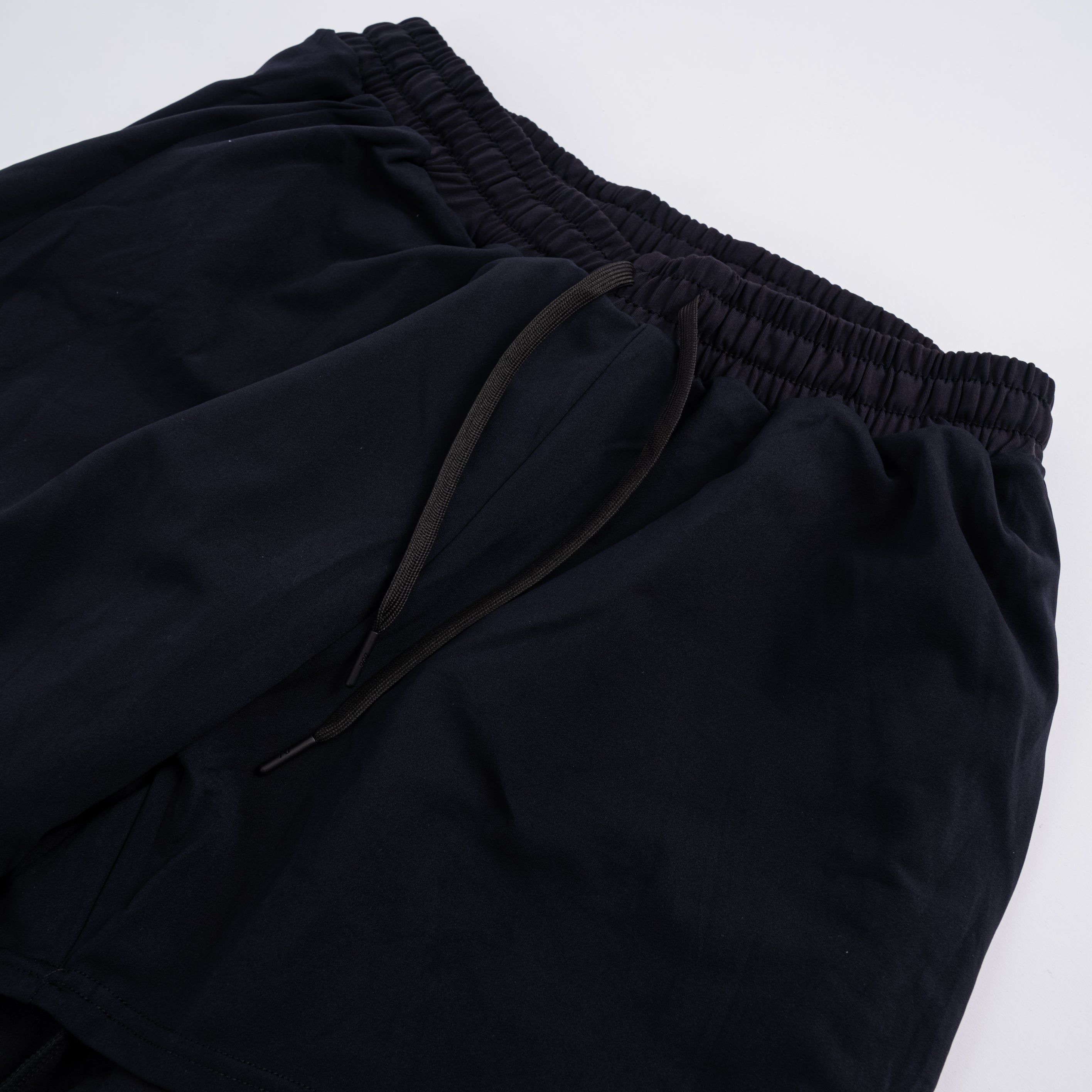 Detail of the hidden drawstrings with A7 aglets on the Cobra 360Go 1Z Joggers in Stealth.