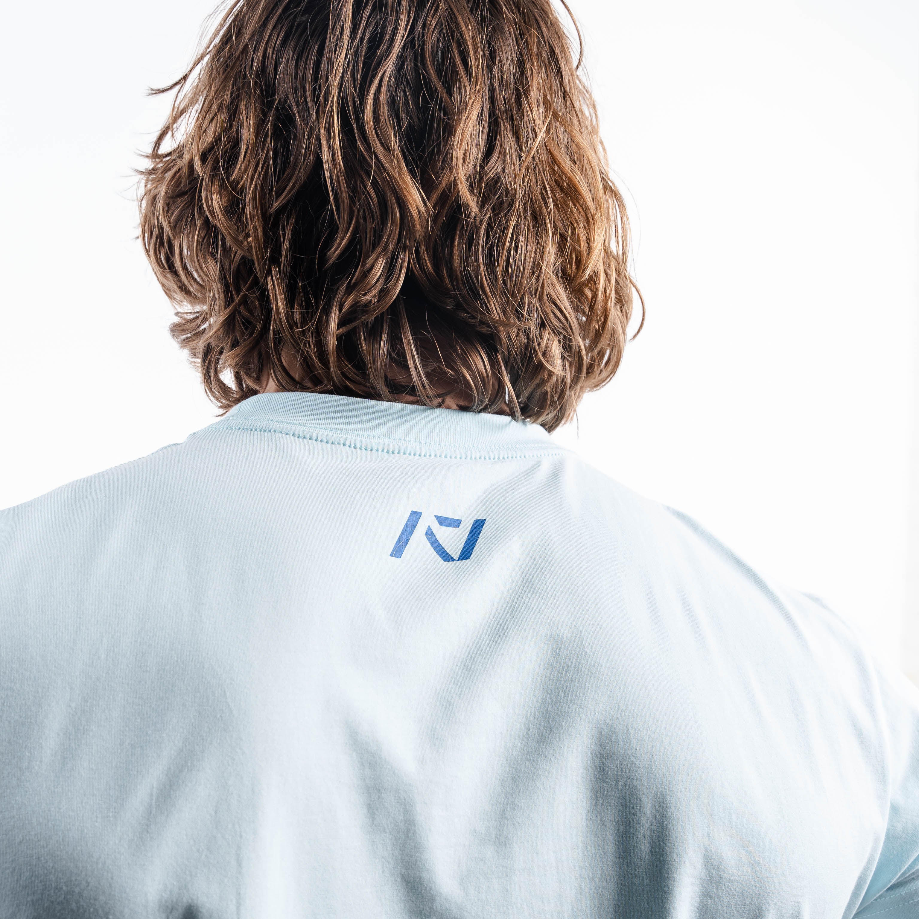 Back view of the Cyanite shirt, highlighting the A7 logo printed just below the neckline.