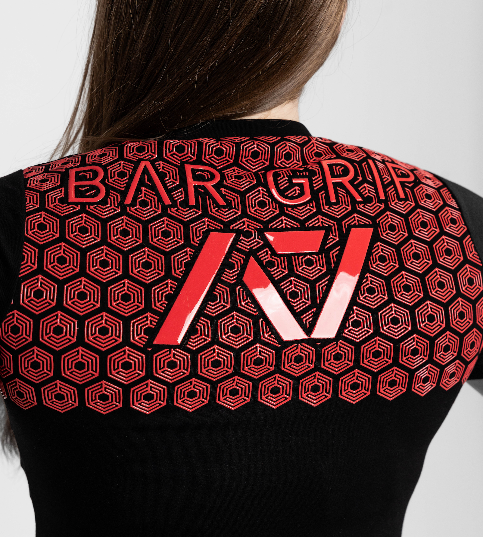 Close up of bar grip on fire bar grip womens shirt