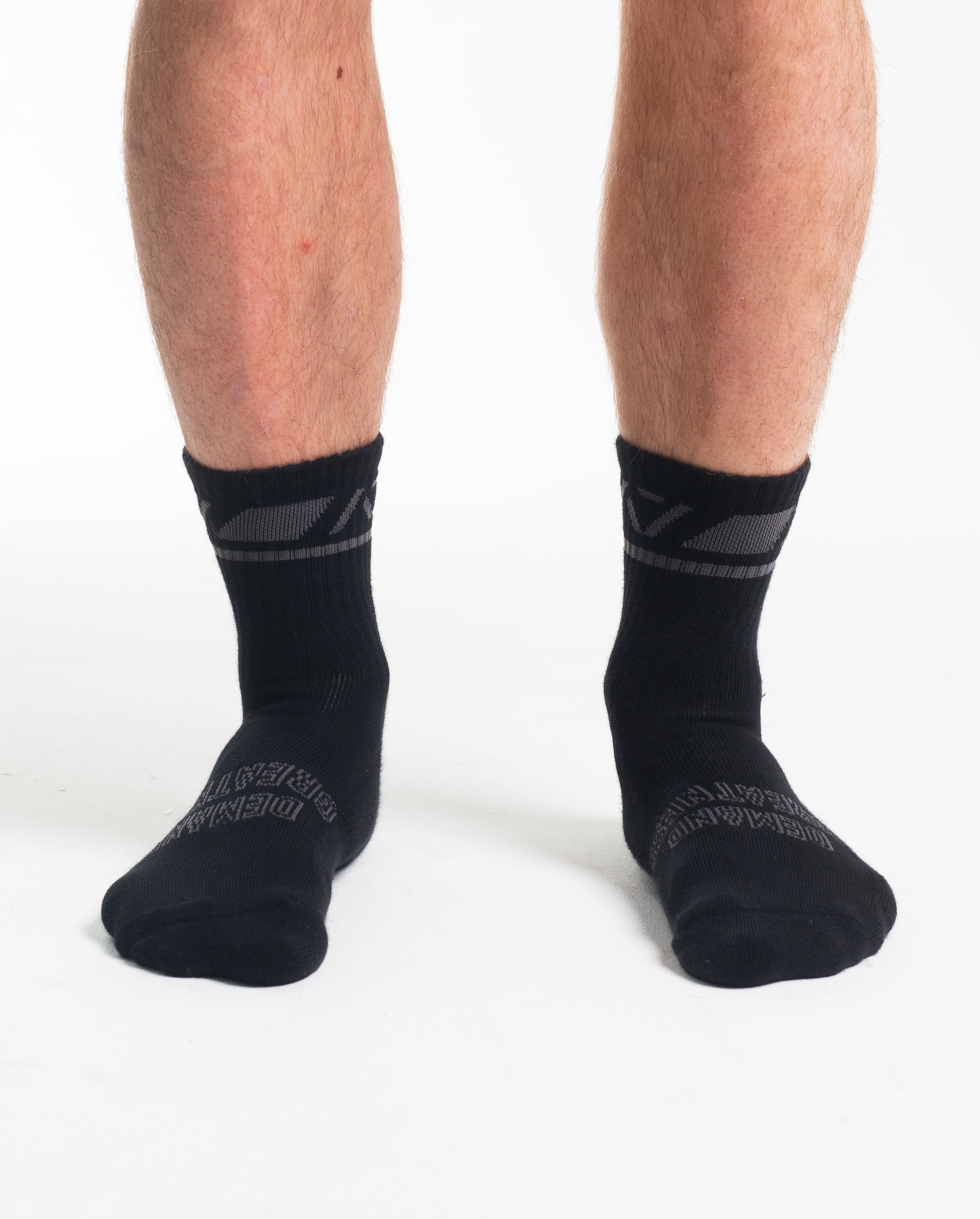 Front view of A7 Crew Socks in Shadow Stone, showcasing mid-shin length and ribbed cuff design.