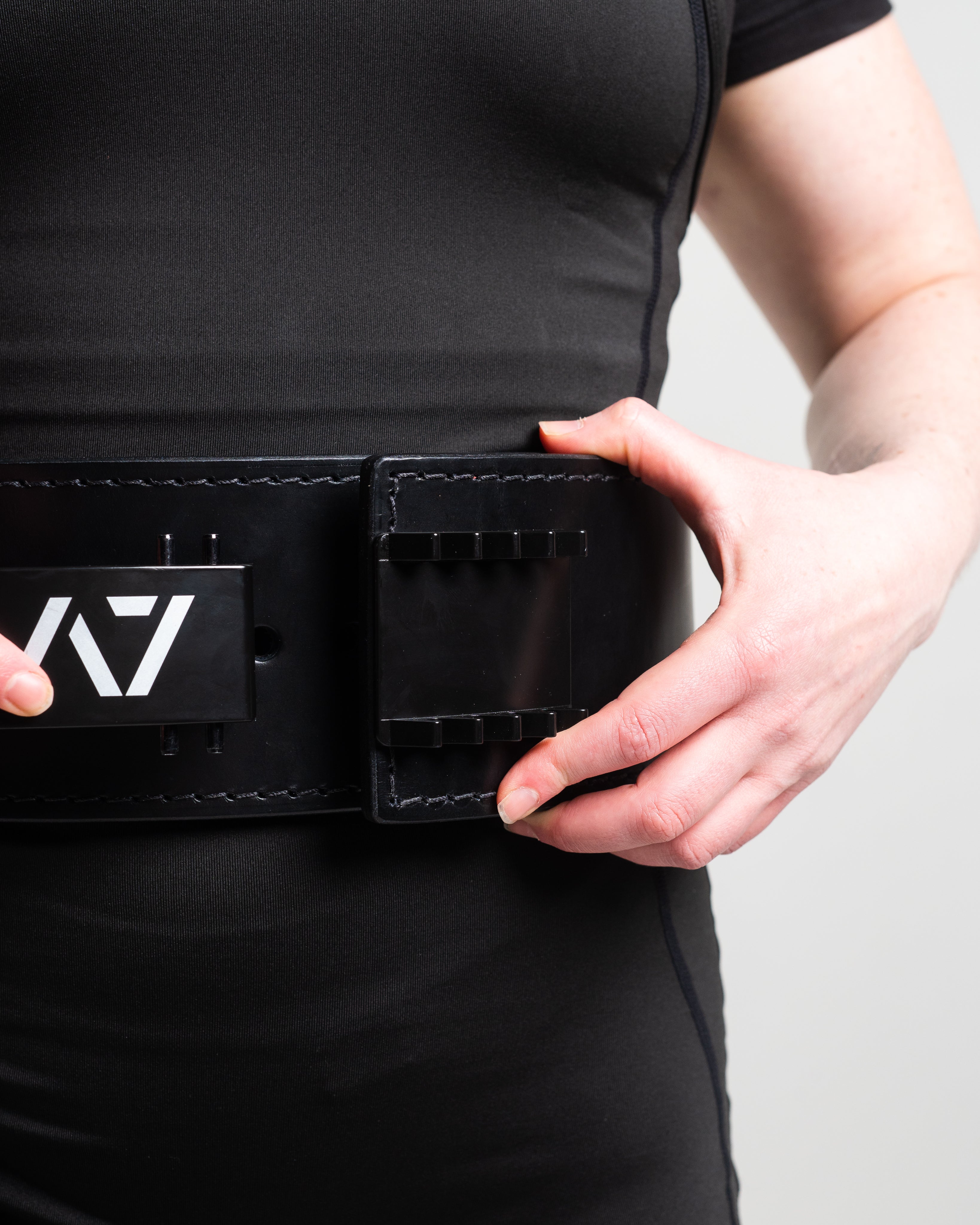 Showcasing A7 Pal Buckle on belt, on lifter.