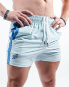 Front view of A7 360Go KWD Shorts in Cyanite showing vibrant two tone blue shorts, wide waistband, and athletic cut.