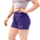 Side profile of Purple 360Go KWD Shorts showcasing short inseam and 360° stretch construction for mobility.

