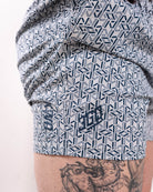 Matte silicone A7 logos on Stelacrosha Tides 360Go Shorts for subtle branding and a premium finish.