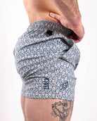Side profile of Stelacrosha Tides 360Go KWD Shorts showing short inseam and flexible stretch fabric for training movement.