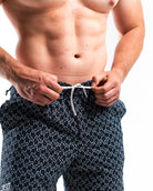 Wide waistband with A7-branded drawstrings on Stelacrosha Black 360Go Shorts for an adjustable, secure fit.