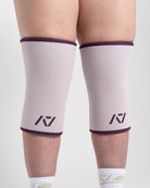 Close up of hourglass knee sleeves in Lavender on female