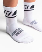 Close-up of the knit fabric on A7 Crew Socks in Domino White, showing texture and stitching details.