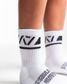 Close-up of the knit fabric on A7 Crew Socks in Domino White, showing texture and stitching details.