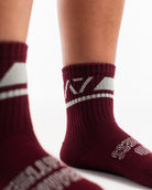 Close-up of the knit fabric on A7 Crew Socks in Ivory Rose, showing texture and stitching details.