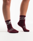 Side profile of A7 Crew Socks in Ivory Rose, highlighting the A7 logo on the ankle and compression-style top.