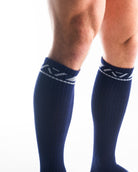 Close-up of the knit fabric on A7 Deadlift Socks in Night Light, showing texture and stitching details.