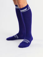 Close-up of knit texture on the purple deadlift socks, highlighting stitch detail and durable fabric.