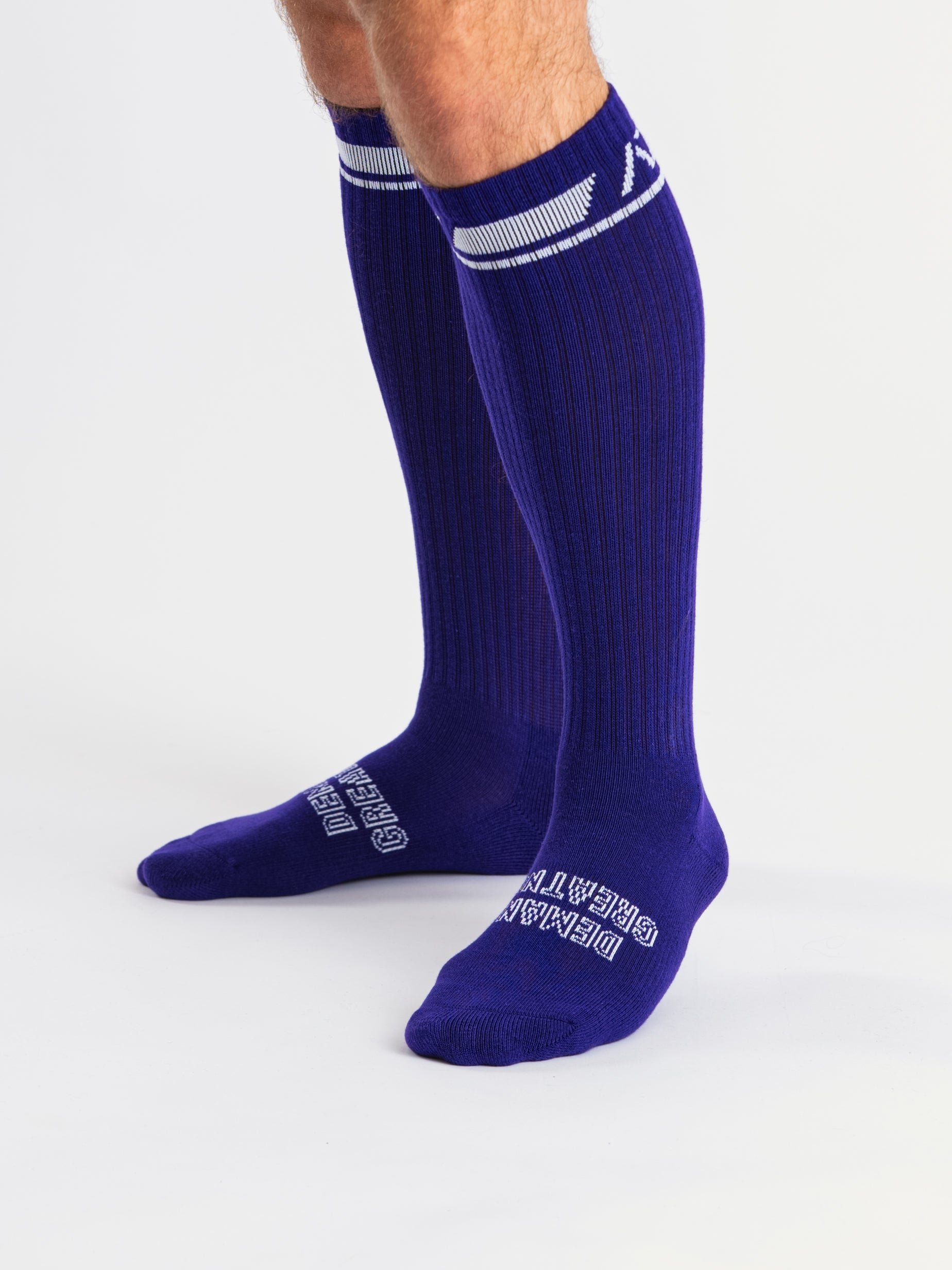 Close-up of knit texture on the purple deadlift socks, highlighting stitch detail and durable fabric.