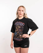 Side profile of Aztec Warrior Over-Fit Unisex Shirt demonstrating the relaxed fit and sleeve length.