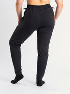 Back view of a7-us.mombra 360Go 1Z Joggers in Stealth, highlighting the elastic waistband and ankle cuffs