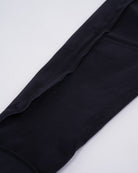 Close-up of inside leg seams on the a7-us.mombra 360Go 1Z Joggers – Stealth, highlighting reinforced stitching for durability and flexibility during training.
