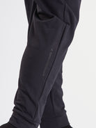 Close-up of the printed silicone A7 logo on the left leg of the Cobra 360Go 1Z Joggers in Stealth.