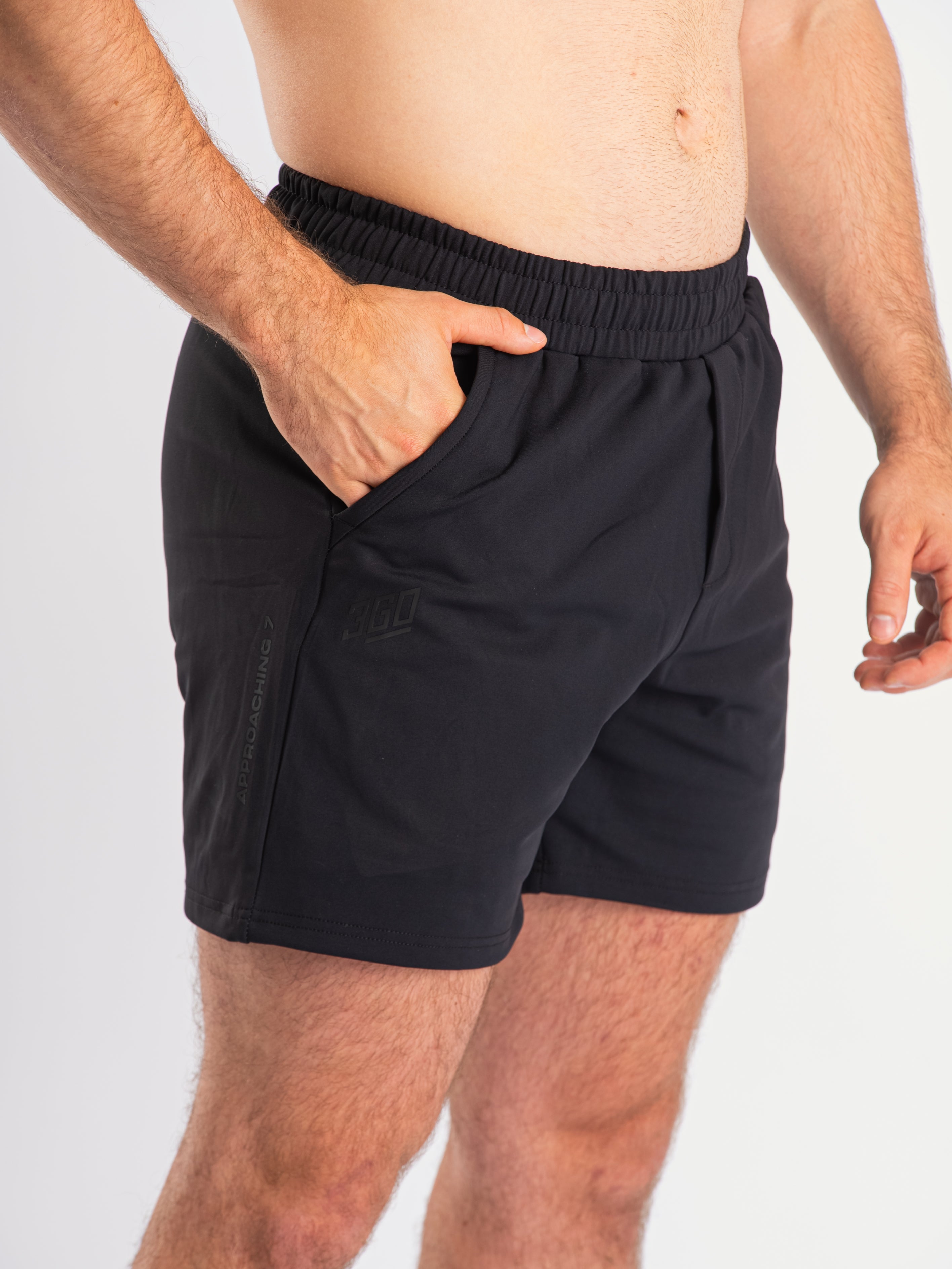 Front view of a7-us.mombra 360Go 1Z Shorts in Stealth, showcasing the sleek design and tapered leg fit.