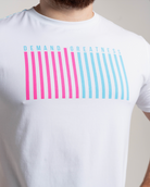 White t-shirt with 'Demand Greatness' text and pink and blue striped design on a plain background