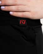 fire bar grip womens shirt with hem tag on model