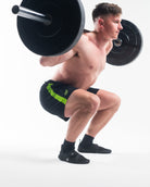 Showcasing the 360 degree stretch hitting depth in a squat.