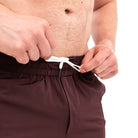Wide waistband with A7-branded drawstrings on Mahogany 360Go Shorts for a customizable, no-slip fit.