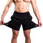 Close-up of 360-degree stretch fabric on Black 360Go Shorts for full mobility during strength and conditioning work.