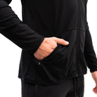 Close-up of the concealed zipper pocket on the Defy Jacket – Gold Standard, highlighting the matte zipper and soft 4-way stretch fabric for secure storage and comfort.